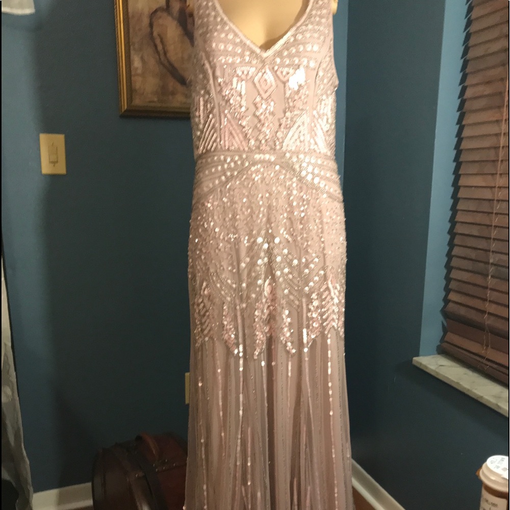 Simply stunning evening gown!! Never worn.